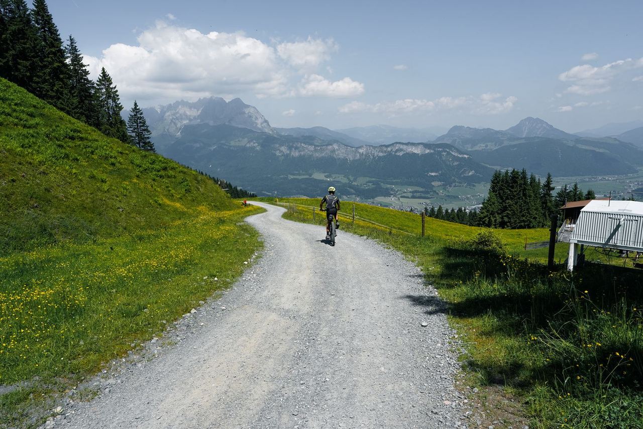 Illustrative photo: cyclist on a mountain path
